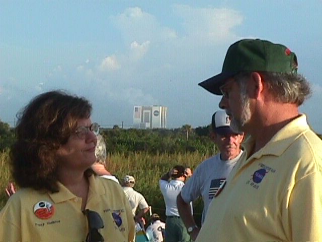 Bo Smith and Penny Haskins discuss the program with the VAB in the background