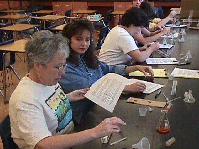 Pasco Teachers (foreground) conducting lab activity